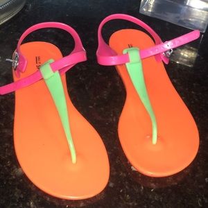 Neon orange green and pink sandals.